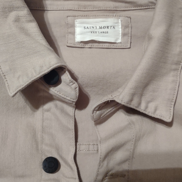 Distressed jacket with pockets and button closures - Picture 3 of 4